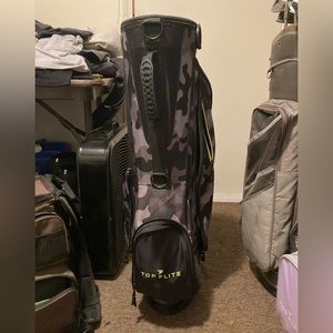Slightly used top flite free standing golf bag. Camo! Perfect condition.